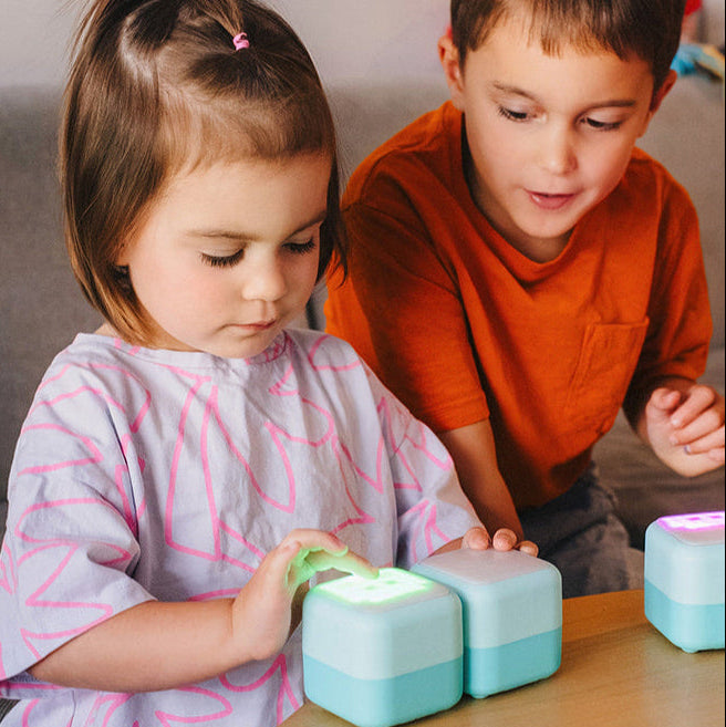 Family playing with Tokidos PlayCubes