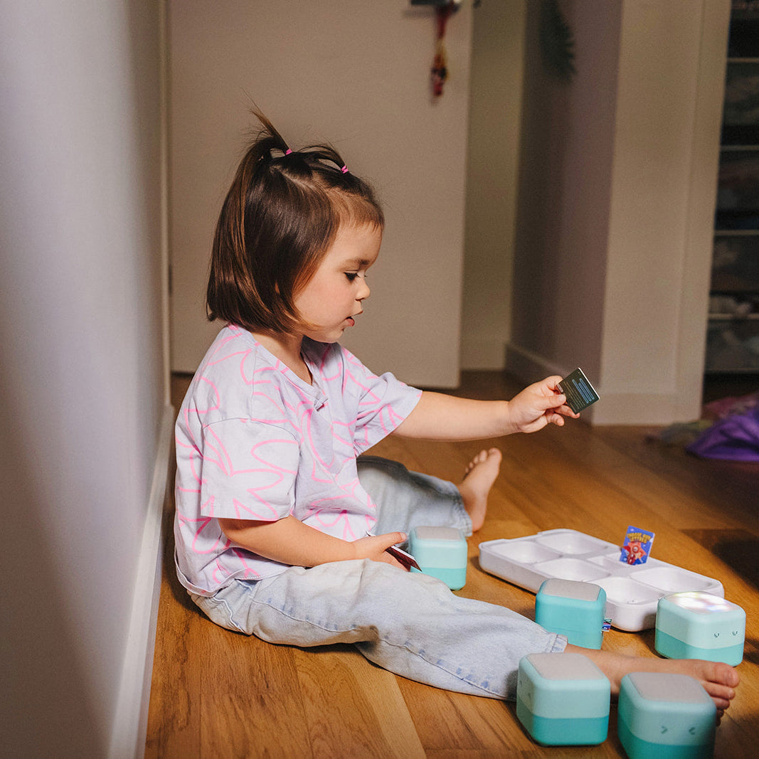 Family playing with Tokidos PlayCubes