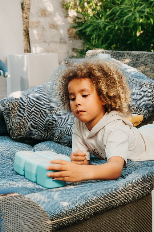 Kids playing with Tokidos PlayCubes outdoors